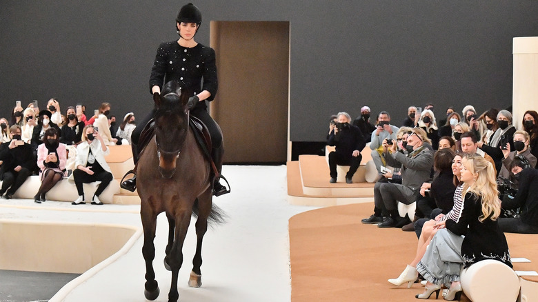 Charlotte Casiraghi rides her horse on a runway