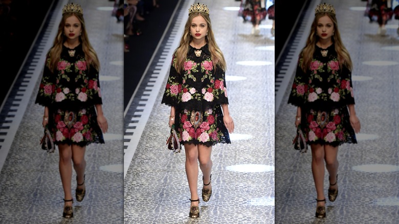 Lady Amelia Windsor walks the runway in a crown