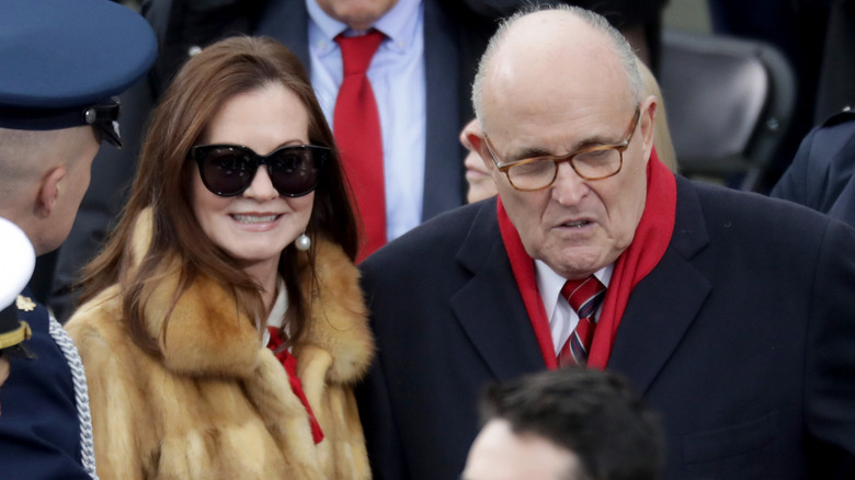 Rudy Giuliani and Judith Nathan talking