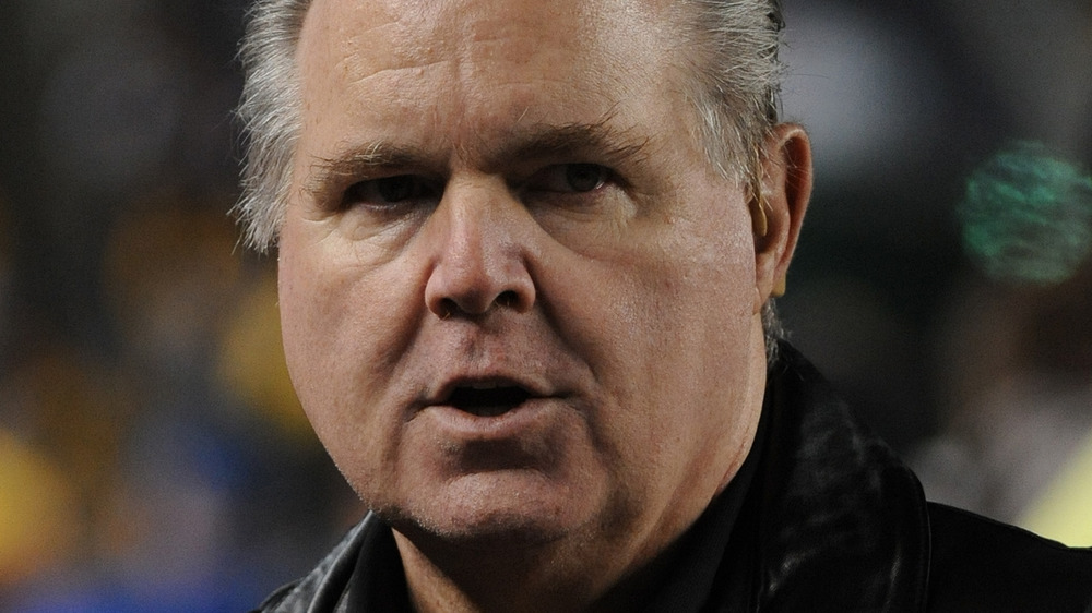 Rush Limbaugh watching football game