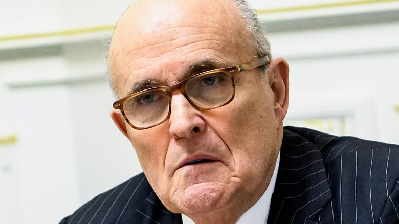 Rudy Giuliani in striped suit