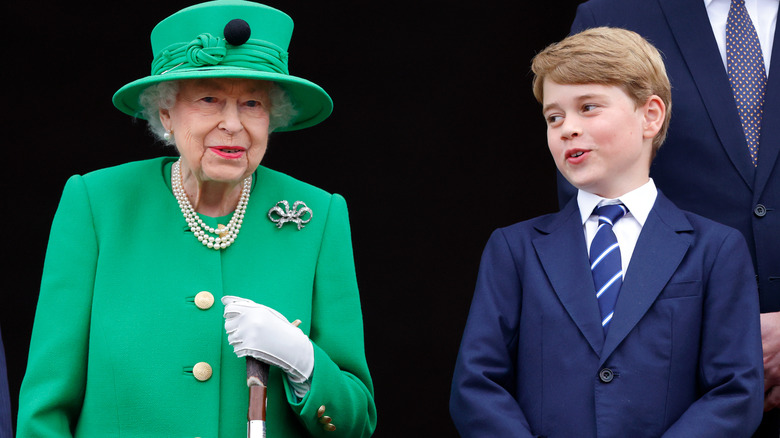 Queen Elizabeth II chatting with Prince George