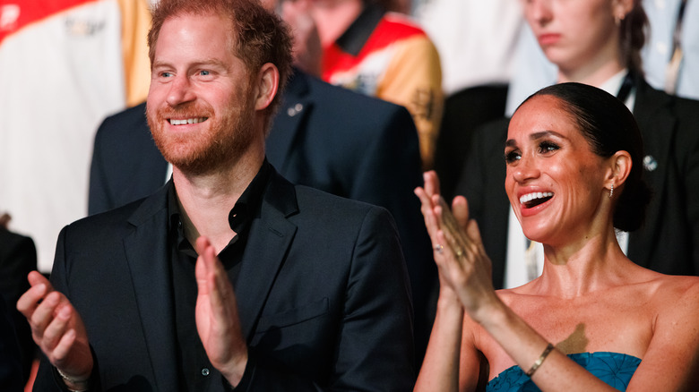 Harry and Meghan clapping 