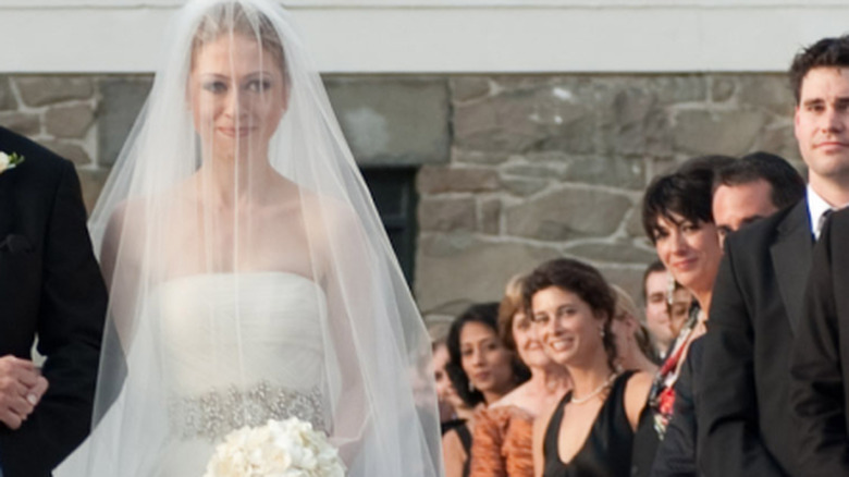 Bill Clinton walks Chelsea Clinton down the aisle at her wedding