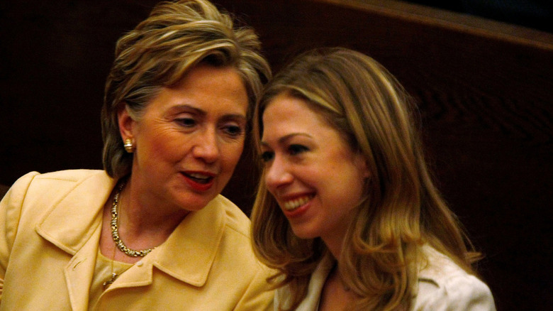Hillary Clinton and Chelsea Clinton in the pews of a Methodist Church