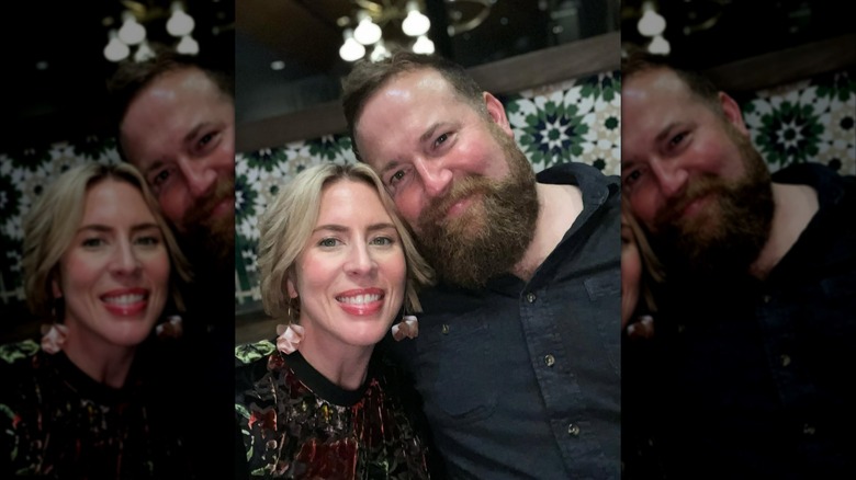 Erin Napier and Ben Napier smiling while posing for a pic together