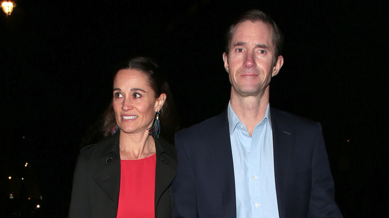 Pippa Middleton and James Matthews walking.