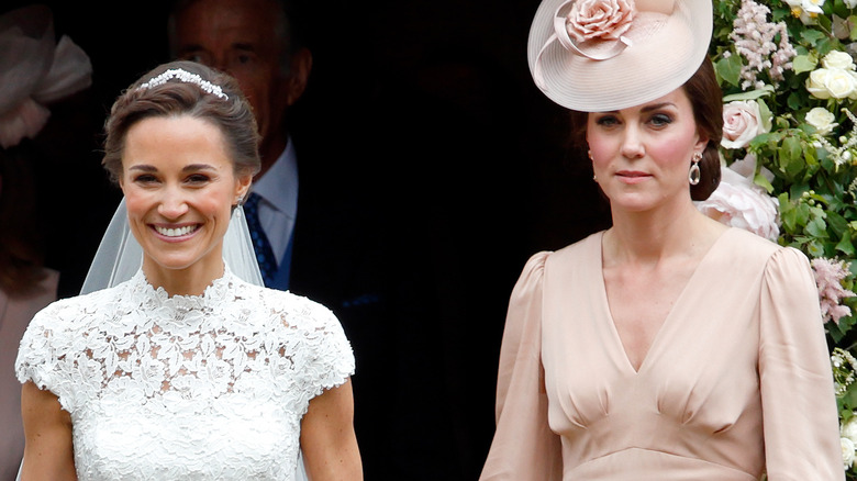 Kate walking next to Pippa on Pippa's wedding day.