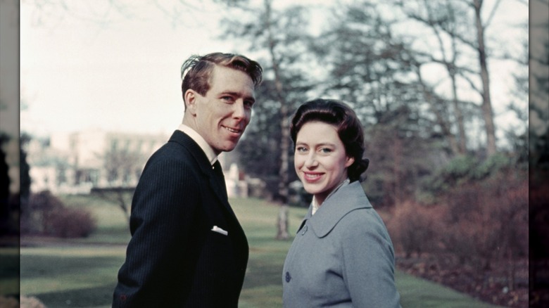 Princess Margaret and Anthony Armstrong-Jones leave Windsor lodge to stroll the grounds following the announcement of their engagement (1960)