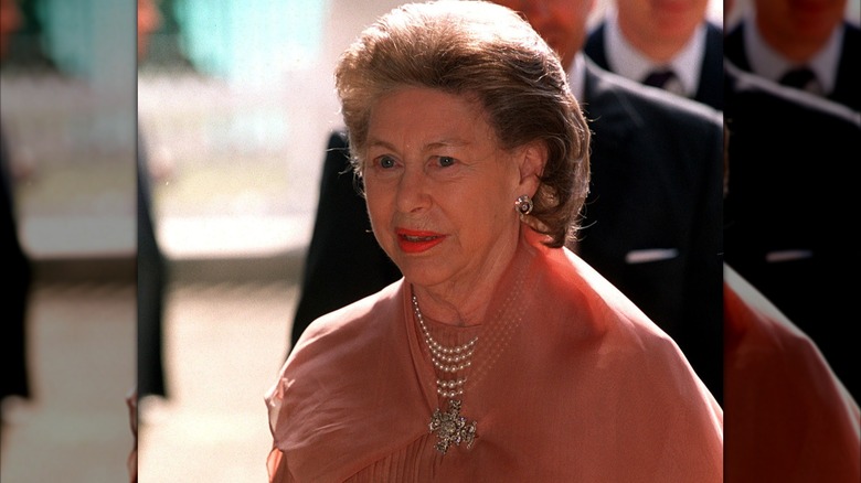 Princess Margaret arrives at a pageant held in honor of the 100th birthday of the Queen Mother