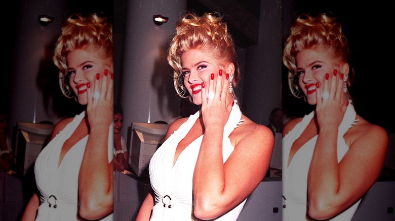 Anna Nicole Smith showing off her engagement ring from J. Howard Marshall
