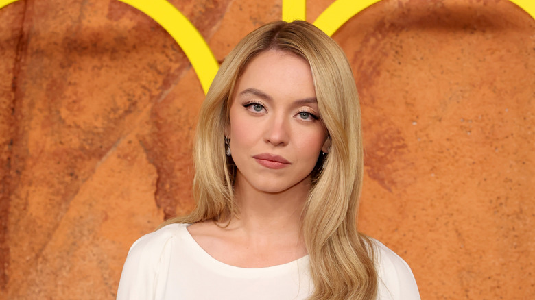 Sydney Sweeney in a white dress