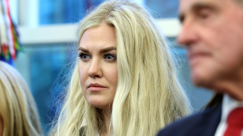 Erika Kirk looking left