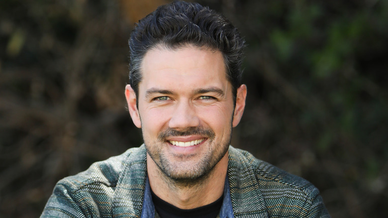 Ryan Paevey smiling