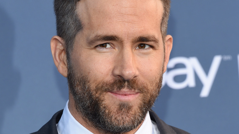 Ryan Reynolds with beard smiling