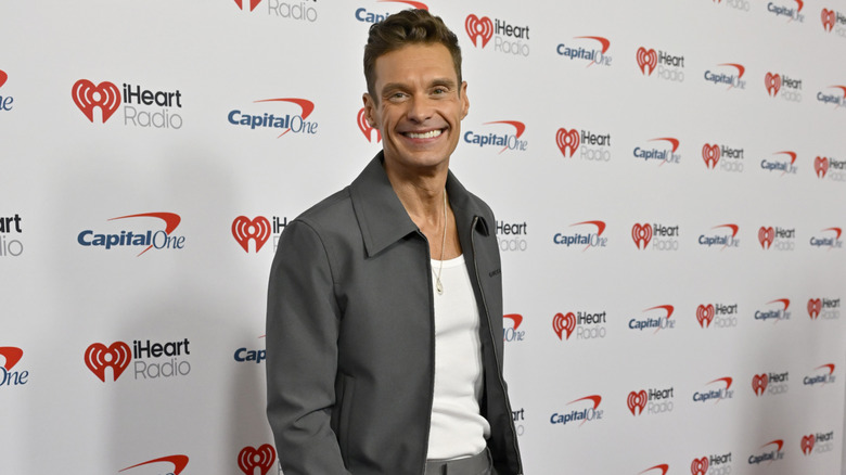 Ryan Seacrest smiling for photo at the iHeartRadio Music Festival