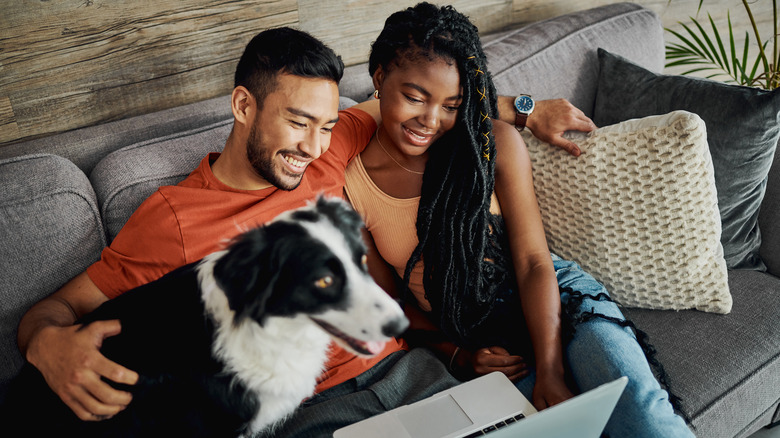 Couple looking at a laptop