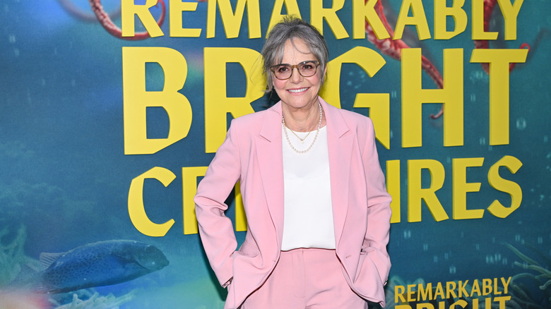 Sally Field wearing a pink suit and white top