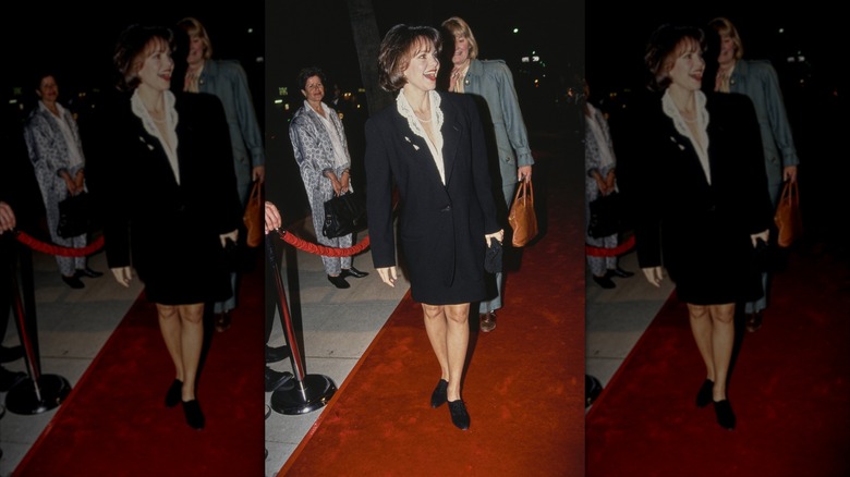 Sally Field wearing a power suit jacket on the red carpet in the 1990s