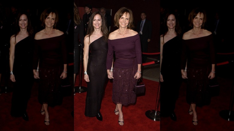 Holly Hunter and Sally Field holding hands at the Emmys in 2001