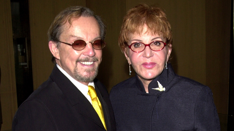 Karl Sonderlund smiling and Sally Jessy Raphael looking ready to talk