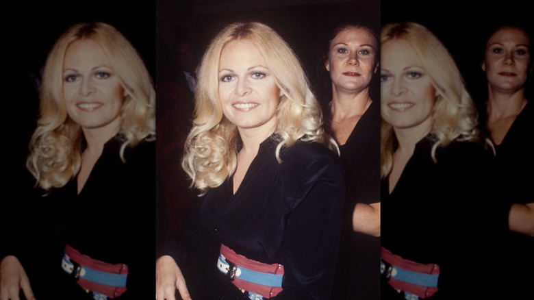 Sally Struthers pictured in 1973 wearing a black velvet dress and belt