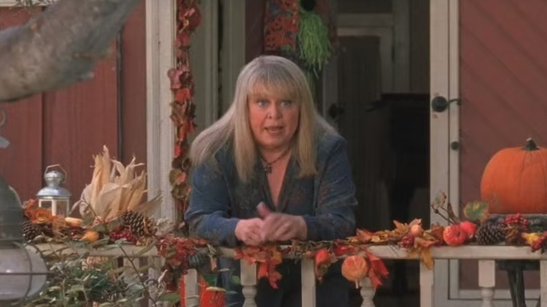 Sally Struthers pictured as Babette Dell leaning over a rail in Gilmore Girls