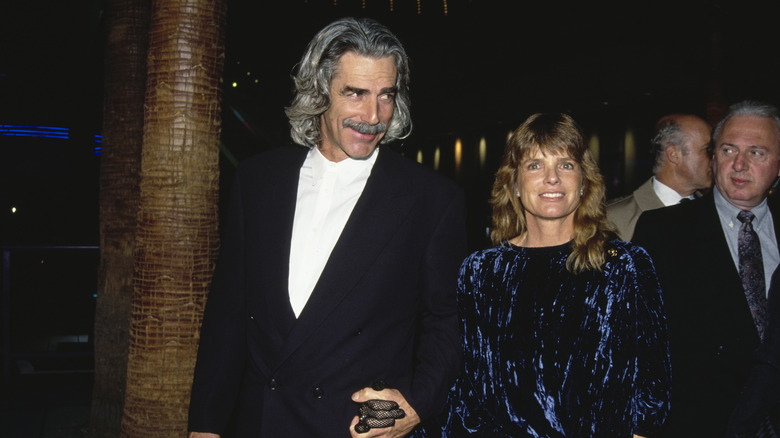 Sam Elliott and Katharine Ross walking hand in hand in 1991.