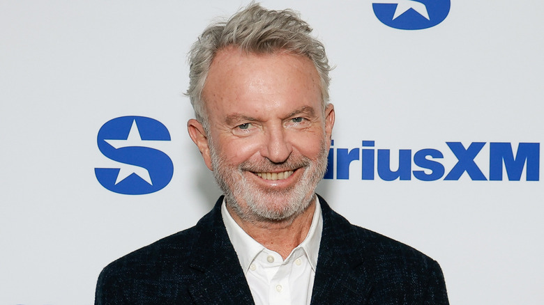 Jurassic Park star Sam Neill smiling