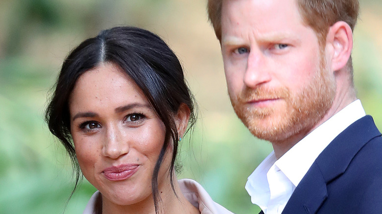 Prince Harry and Meghan Markle posing 