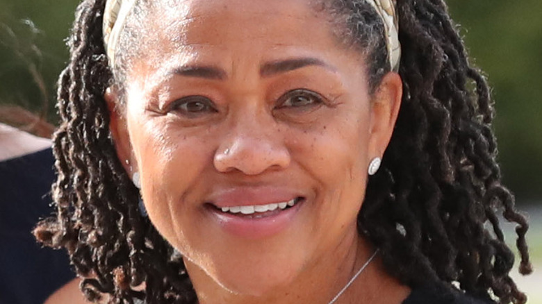 Doria Ragland smiling in a headband