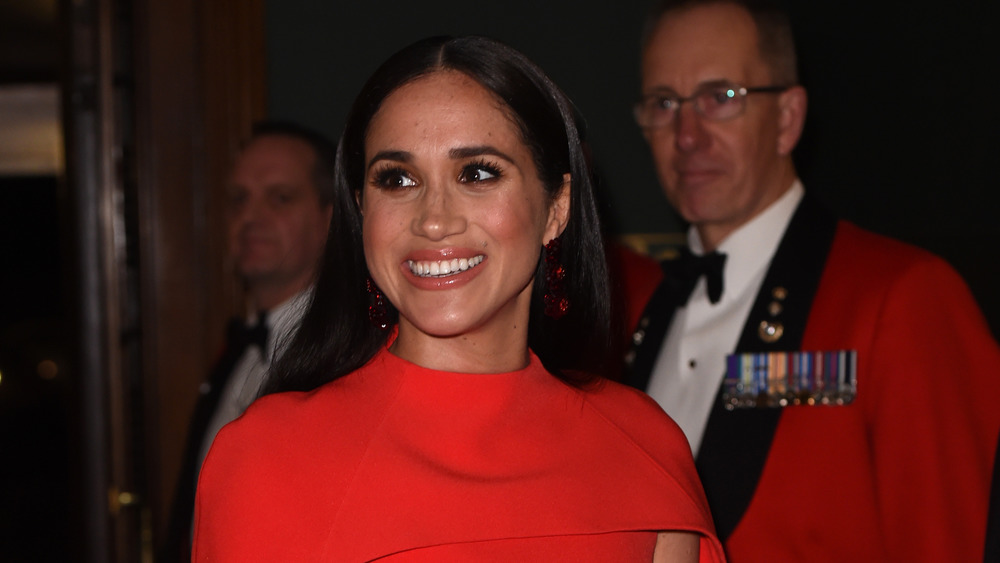 Meghan Markle in a red gown