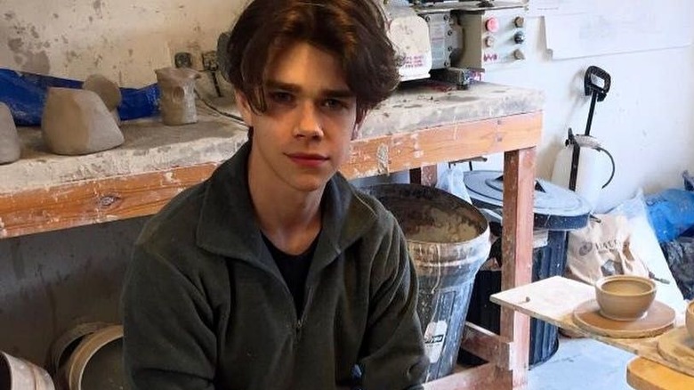 Samuel Chatto sitting in pottery studio