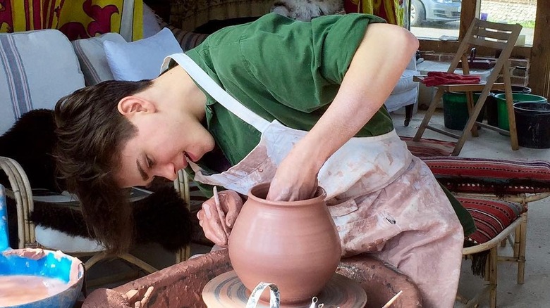 Samuel Chatto at a potter's wheel