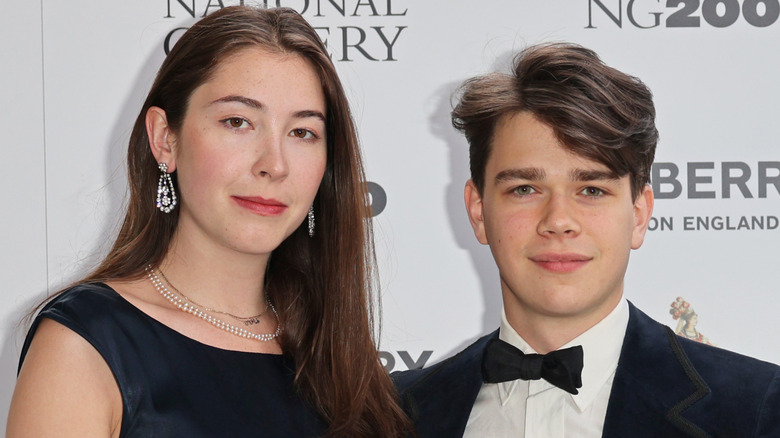 Eleanor Ekserdjian and Samuel Chatto posing on step-and-repeat