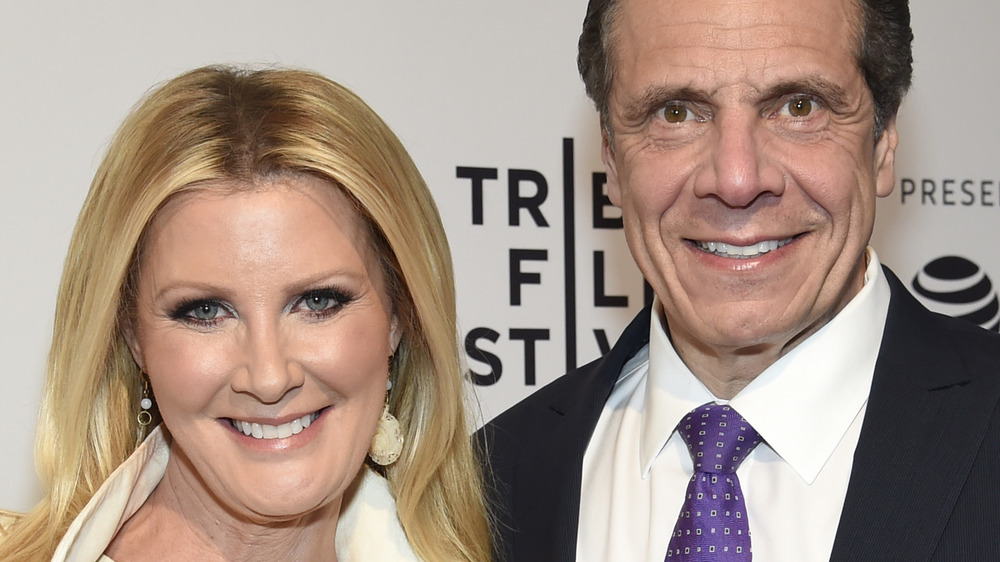 Andrew Cuomo and Sandra Lee smile