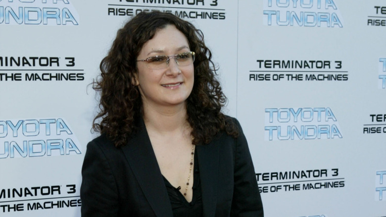Sara Gilbert wearing glasses while attending a movie premiere