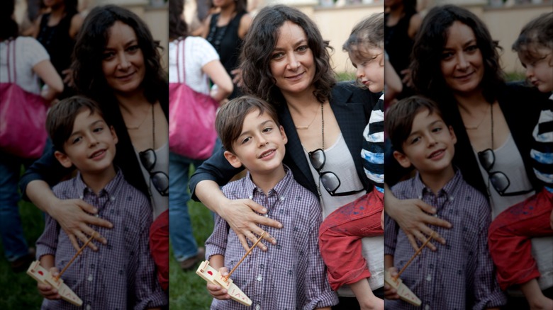 Sara Gilbert posing with son Levi and daughter Sawyer