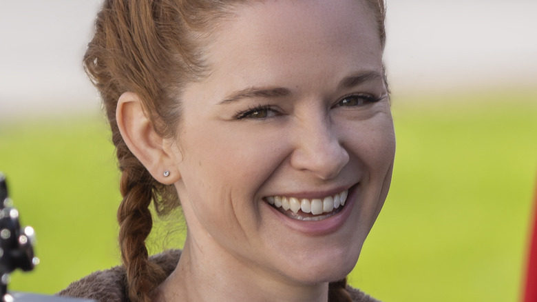 Sarah Drew smiling on set of Reindeer Games Homecoming