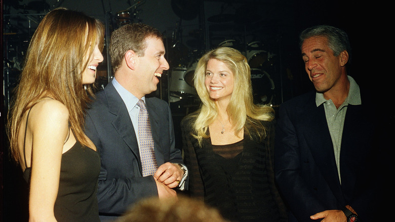 Prince Andrew smiling at a party with Jeffrey Epstein