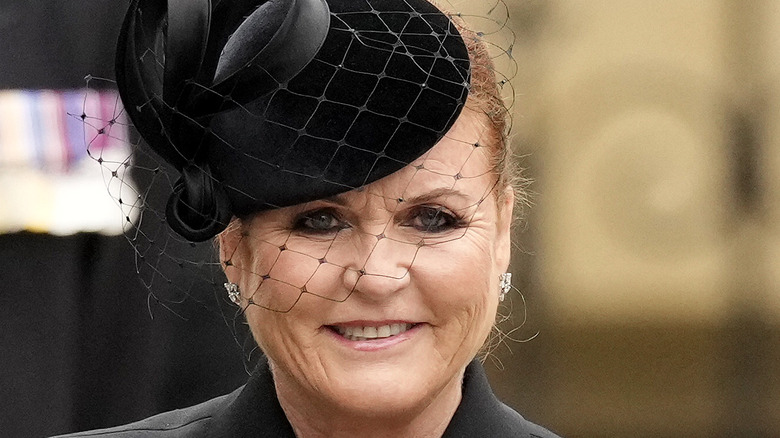 Sarah Ferguson smiles as she arrives at the queen's funeral