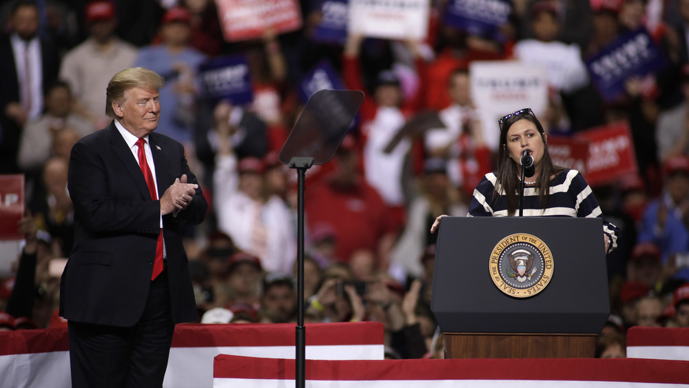 Sarah Huckabee Sanders and Donald Trump