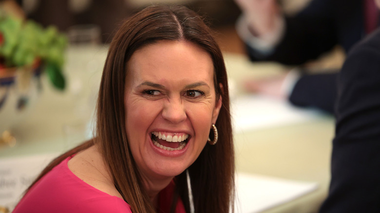 Sarah Huckabee Sanders laughing