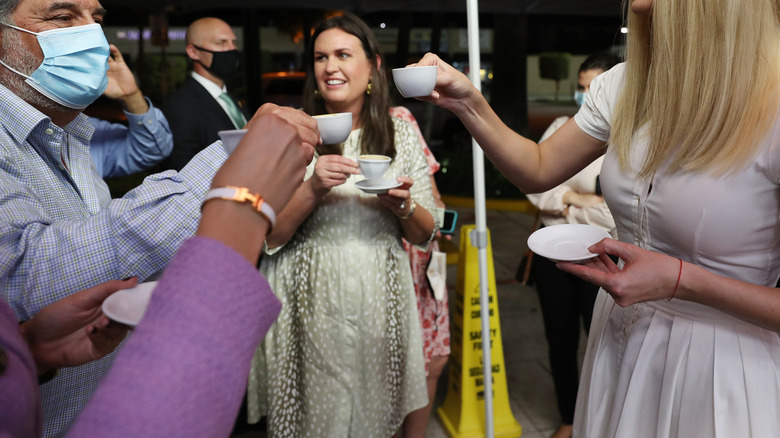 Sarah Huckabee Sanders drinking coffee