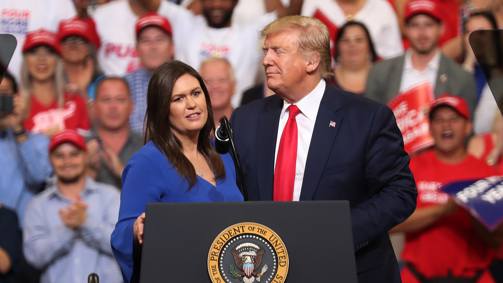 Sarah Huckabee Sanders and Donald Trump