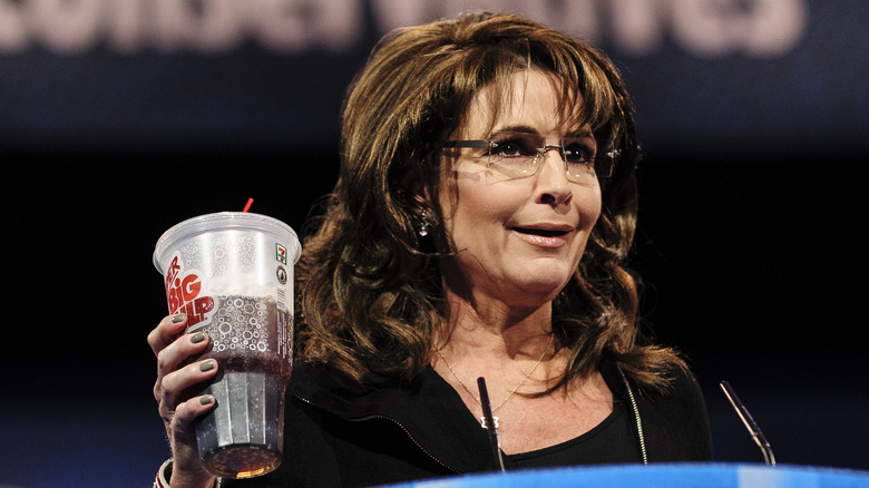Sarah Palin holds up a Big Gulp onstage