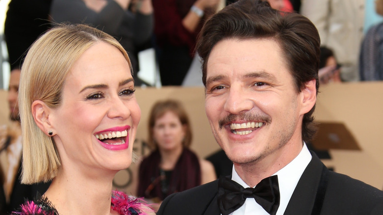 Sarah Paulson and Pedro Pascal smiling on the red carpet