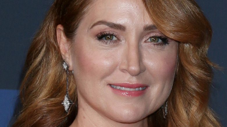 Sasha Alexander smiles