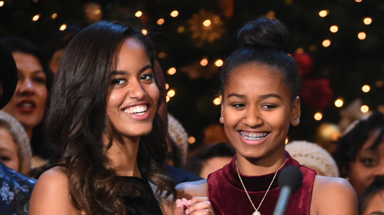 Malia and Sasha Obama smiling