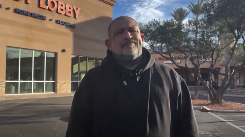 Alexander Zabel Jr. being interviewed as volunteer search organizer in Hobby Lobby parking lot